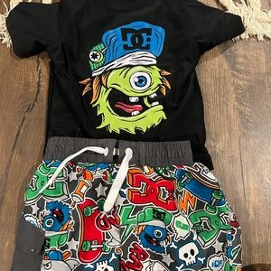 Dc 12 months swim trunks and rash guard like new